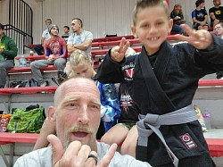 Coacging the kids at jiujitsu tournament